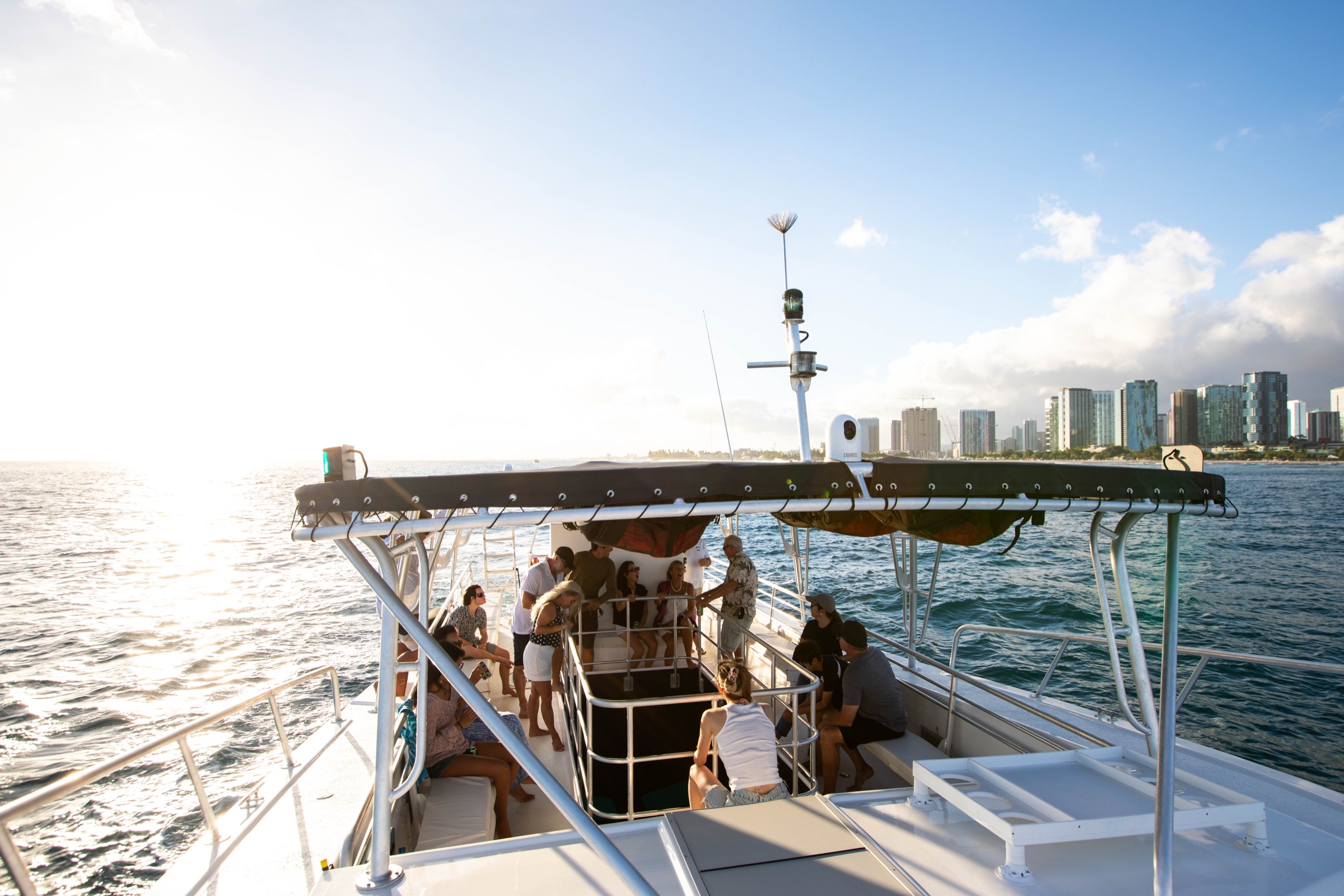 Guests on deck during the Waikīkī sunset